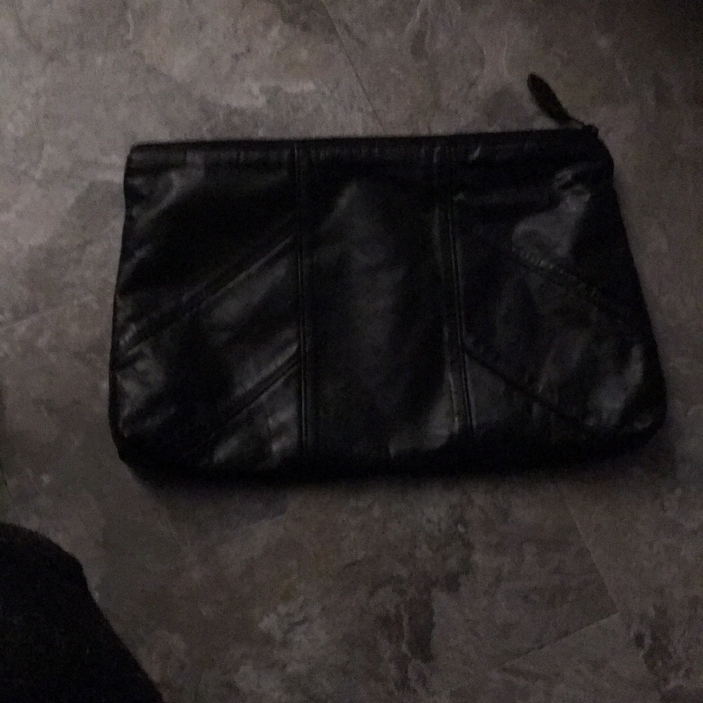 A used woman’s purse  don’t need anymore.